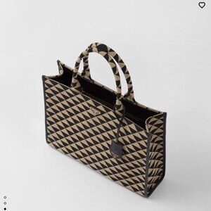 large prada symbole embroidered fabric handbag